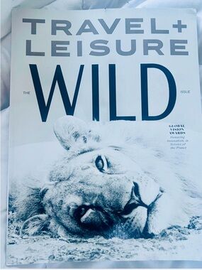 Travel + Leisure WILD Magazine - Lion Photo April 2026
